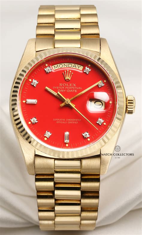 red and gold rolex watch|Rolex watch with red face.